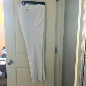 Men’s Puma slacks in white. 34x32